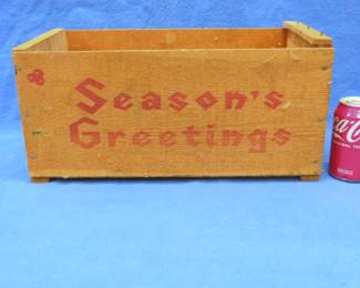 Lot 448. Wooden fruit crate with "Seasons Greetings" logo