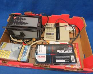 Lot 456. Adding machine, candle house, Nitril gloves, and more