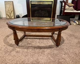 Wood and glass oval coffee table 