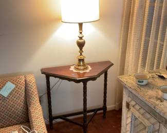 Brass lamp , on antique table