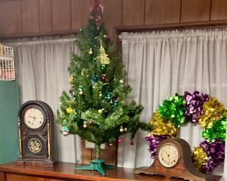 Vintage decorated Christmas tree , mantle clocks