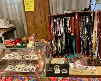 Sterling jewelry from Mexico, Siam, India and others, necklaces, glass Mardi Gras beads, snap pop beads, plastic Mardi Gras necklaces from Hong Kong