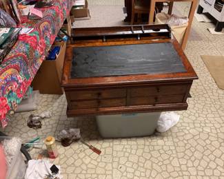 Spool cabinet desk top, has hole for inkwell and pen or pencil holders