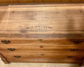 Stamp underneath marble top to dresser