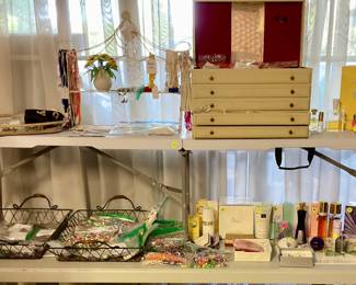 Tons of signed and unsigned costume Jewelry, perfumes some still in gift sets