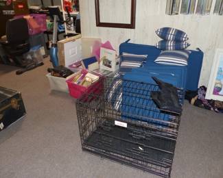 Dog cage, books, cushions for outdoor dining set