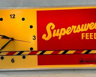 ‘Supersweet Feeds’ Lighted Lexan Clock, 25in x 12in