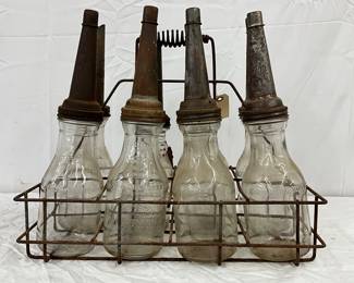 8 Emb. Early Glass Oil Bottles with Metal Spouts and Wire Rack