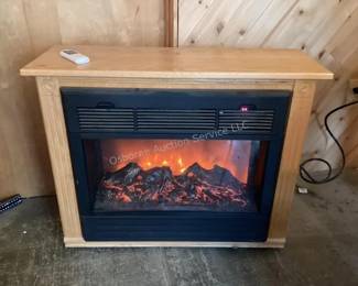 Heat Surge electric fireplace with remote