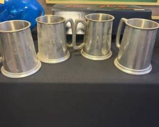 Set of Four Pewter Tankards with Engravings