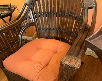 two rattan armchairs