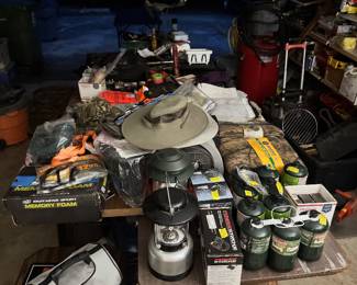 Lots of hunting gear and LP propane canisister