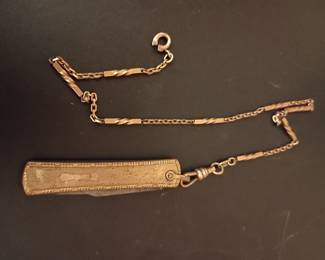 vintage folding pocket knife with a chain fob
