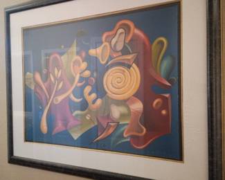 Colorful framed abstract artwork featuring bold surreal shapes and modern contemporary styling