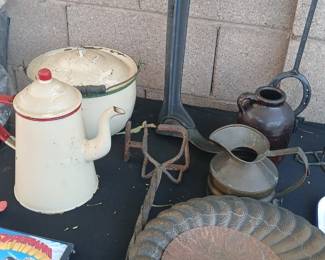 primitive / farmhouse smalls with a mix of enamelware, rusty metal, pottery, and decorative salvage