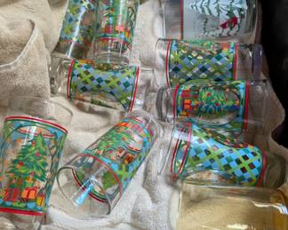 Several sets of Christmas glassware and place settings