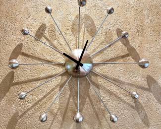 $250 - Wall Antena clock purchased at Barneys N.Y. 2004. Arm lengths and spheres are adjustable.