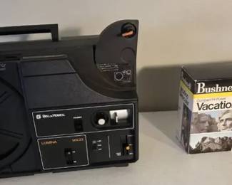 Bell  Howell Lumina MX33 Projector  Bushnell Binoculars