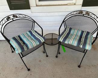 2 Wrought Iron Patio Chairs with Cushions and Small Table