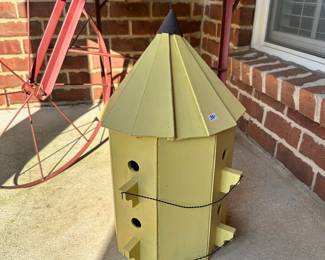 #018		Charming Yellow Hexagon Birdhouse w Pointed Roof 21”t x 12”w. One loose wire just needs staple.	 $ 25.00 																						