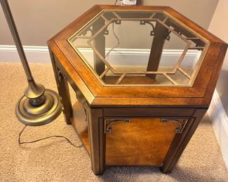 #013		Vintage Campaign-style hexagonal side table with glass top and brass fretwork detailing and 1 shelf. watermark on bottom shelf (shown in photo) 23-26” w x20”h	 $ 60.00 																						