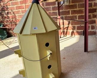 #018		Charming Yellow Hexagon Birdhouse w Pointed Roof 21”t x 12”w. One loose wire just needs staple.	 $ 25.00 																						