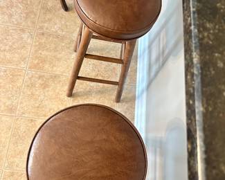 #045 Pair 29” Vintage Wooden Bar Height Stools w Faux Warm Brown Leather Top 29”h x 14.5”w seat 12.5” round $25