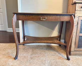 #014		Antique Library Table. Tiger Oak Look. 1 drawer, 1 Lower Shelf Some light scratches on top (shown in picture). Overall amazing condition for such an old piece. 36”w x 23.5”d x 30”t	 $ 180.00 																						