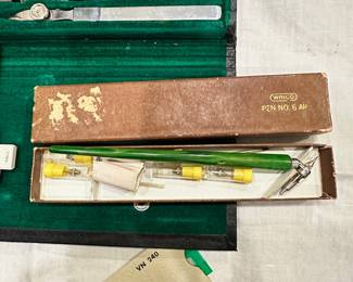 #038		"Lot of Vintage Drafting Tools Tacro drafting tool kit 2336 Wrico pen no. 6 AR (lettering pen) Keuffel & Esser (K&E) slide ruler w case IBM flow chart form Wrico Lettering Guide"	 $ 75.00 																						