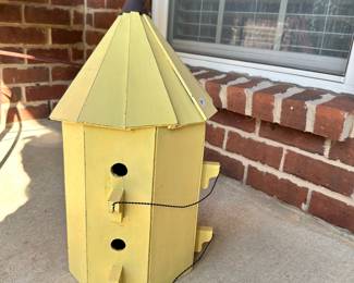 #018		Charming Yellow Hexagon Birdhouse w Pointed Roof 21”t x 12”w. One loose wire just needs staple.	 $ 25.00 																						