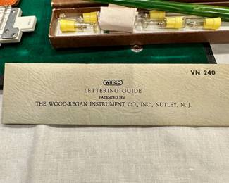 #038		"Lot of Vintage Drafting Tools Tacro drafting tool kit 2336 Wrico pen no. 6 AR (lettering pen) Keuffel & Esser (K&E) slide ruler w case IBM flow chart form Wrico Lettering Guide"	 $ 75.00 																						