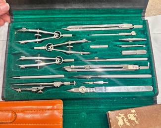 #038		"Lot of Vintage Drafting Tools Tacro drafting tool kit 2336 Wrico pen no. 6 AR (lettering pen) Keuffel & Esser (K&E) slide ruler w case IBM flow chart form Wrico Lettering Guide"	 $ 75.00 																						
