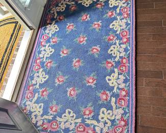 #031		Vintage Tufted Machine Made Rug. Blue w Red/Pink Floral 66”L x 42”W Beautiful, vivid colors. Fabric backing shows some wear.	 $ 55.00 																						