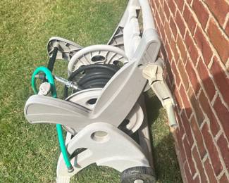 #021		Suncast Hose Reel Cart w Hose. Good preowned condition Works great but has some wear (shown in pictures)	 $ 18.00 																						