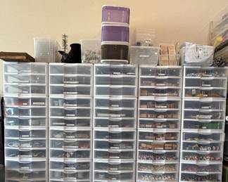 Head to toe filled drawers of crafting supplies