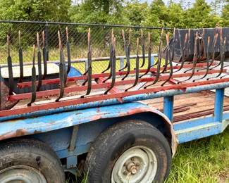 Long rake tractor attachment