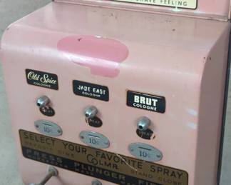 Coin-Operated Cologne Dispenser