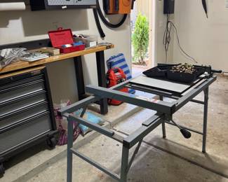 Saw table, hanging vacume, power washer, cabinets