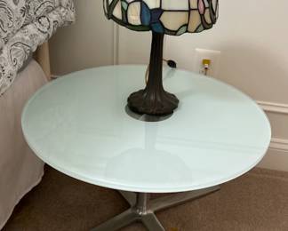 One of 2 identical glass side tables