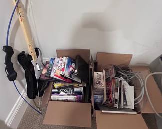 Nintendo Wii Guitar Hero controller and assorted games