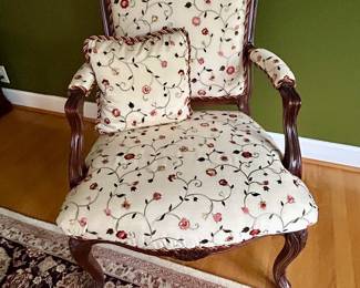 Louis XV-style antique mahogany armchair with floral upholstery