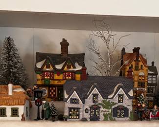 Several Department 56 Dickens' Village pieces