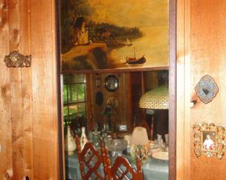 Mirror with art scene at top