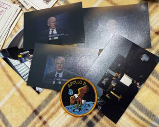 Apollo 11 insignia patch and astronaut crew photographs Michael Collins and Neil Armstrong later in life public appearances