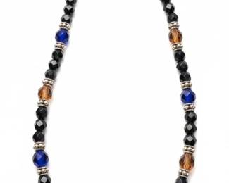 Handmade Black, Blue, and Amber Beaded Necklace with Ceramic Focal Bead