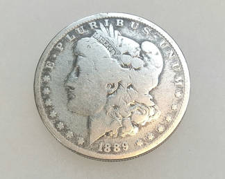 Lot 777: 1889-O Morgan & 1922 Peace Silver Dollars (33+dwt)