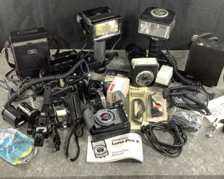 Lot 909: Metz, Vivitar, and Gossen Camera Flashes and Light Meters