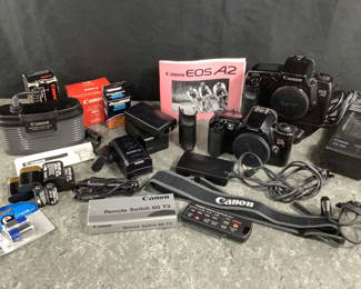 Lot 904: Canon EOS A2 and EOS Rebel XS Film Camera Bodies with Accessories