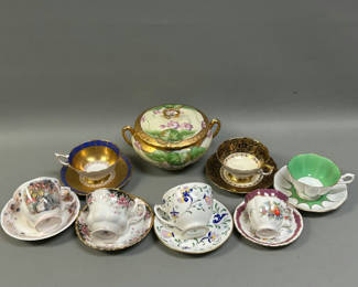 Lot 29: Biscuit Jar, Cups and Saucers 