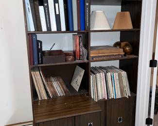 Dark wood bookcase with secretary desk